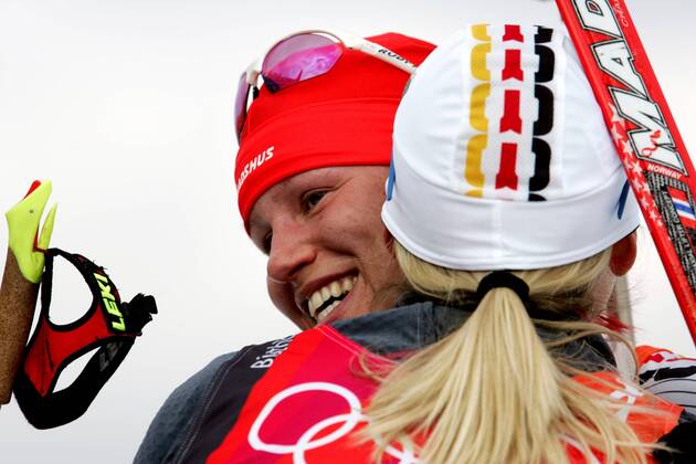 Biathlon women s relay silver medal Olympic Games 2006 recorded in San Sicario on 23 02 2006 Kati Wilhelm embraces Katrin Apel San Sicario, Italy