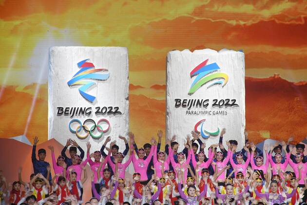(171215) -- BEIJING, Dec. 15, 2017 -- The emblem (L) of Beijing 2022 Olympic Winter games Winterspiele Spiele Summer games and emblem of Beijing 2022 Paralympic Winter Games are seen during the emblem launch ceremony for the Beijing 2022 Olympic and Paralympic Winter Games in Bejing, capital of China, Dec. 15, 2017. ) (SP)CHINA-BEIJING-2022 OLYMPIC AND PARALYMPIC WINTER GAMES EMBLEM-LAUNCH (CN) JuxHuanzong 
