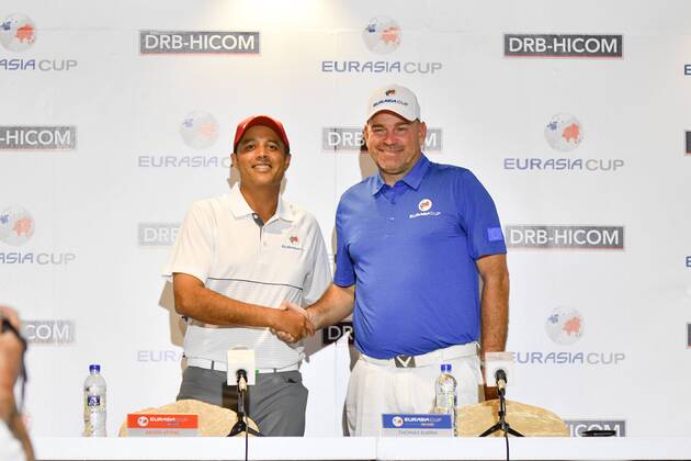 (180109) -- KUALA LUMPUR, Jan.9, 2018 -- Arjun Atwal (L), captain of Team Asia, shakes hands with Thomas Bjorn, captain of Team Europe at a press conference PK Pressekonferenz of the EurAsia Cup at the Glenmarie Golf and Country Club in Kuala Lumpur, Malaysia, Jan. 9, 2018. This year s EurAsia Cup will take place at the Glenmarie Golf and Country Club from Jan. 12 to Jan. 14, 2018. ) (SP)MALAYSIA-KUALA LUMPUR-GOLF-EURASIA CUP-PRESS CONFERENCE ChongxVoonxChung 