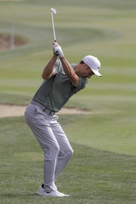 HSBC Abu Dhabi Golf Championship Day Four Ross Fisher hits an iron from the rough on Day Four of the HSBC Abu Dhabi Golf Championship at Abu Dhabi Golf Club, UAE. Content Not Available For UK Newspapers Copyright: xNickxWhitworthx FIL-11242-0024
