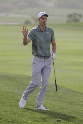 HSBC Abu Dhabi Golf Championship Day Four Ross Fisher acknowledges the crowd on Day Four of the HSBC Abu Dhabi Golf Championship at Abu Dhabi Golf Club, UAE. Content Not Available For UK Newspapers Copyright: xNickxWhitworthx FIL-11242-0034