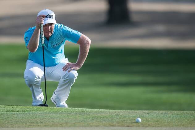 Branden Grace of South Africa lines up a putt during the first round of the Omega Dubai Desert Classic European Tour 2018 at the Emirates Golf Club, Dubai, UAE on 25 January 2018. Copyright: xGrantxWinterx 18690059