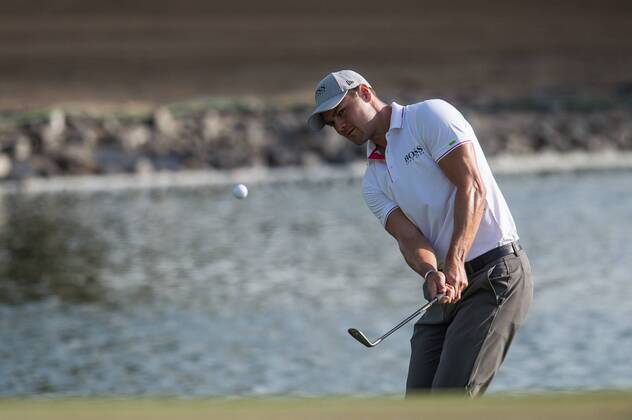 Martin Kaymer of Germany plays a chip shot to the green during the first round of the Omega Dubai Desert Classic European Tour 2018 at the Emirates Golf Club, Dubai, UAE on 25 January 2018. Copyright: xGrantxWinterx 18690064