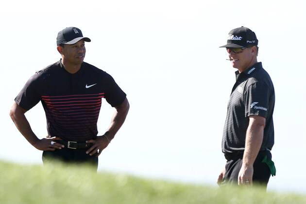 January 25, 2018 - San Diego, California, United States - Tiger Woods and Charley Hoffman wait on the 4th tee during the first round of the 2018 Farmers Insurance Open at Torrey Pines GC. PGA Golf Herren 2018: Farmers Insurance Open - Round 1 - ZUMAw109 20180125_zap_w109_019 Copyright: xDebbyxWongx