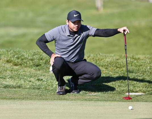January 26, 2018 - San Diego, California, United States - Jason Day lines up a putt on the 9th green during the second round of the 2018 Farmers Insurance Open at Torrey Pines GC. Golf 2018: Farmers Insurance Open - Round 2 - ZUMAw109 20180126_zap_w109_011 Copyright: xDebbyxWongx