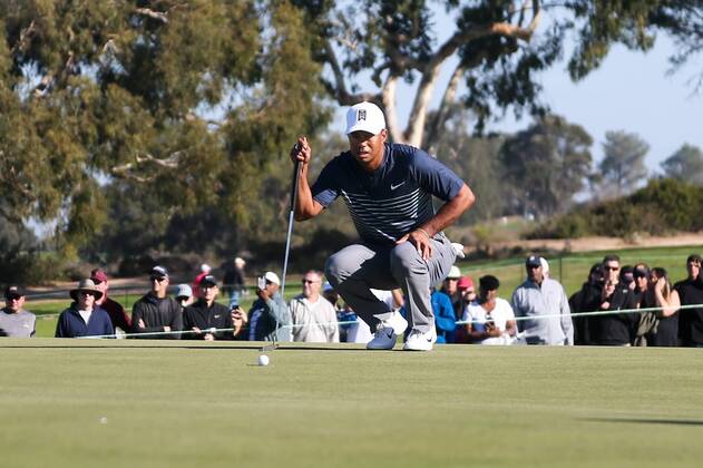 January 26, 2018 - San Diego, California, United States - Tiger Woods lines up a putt on the 10th green during the second round of the 2018 Farmers Insurance Open at Torrey Pines GC. Golf 2018: Farmers Insurance Open - Round 2 - ZUMAw109 20180126_zap_w109_036 Copyright: xDebbyxWongx