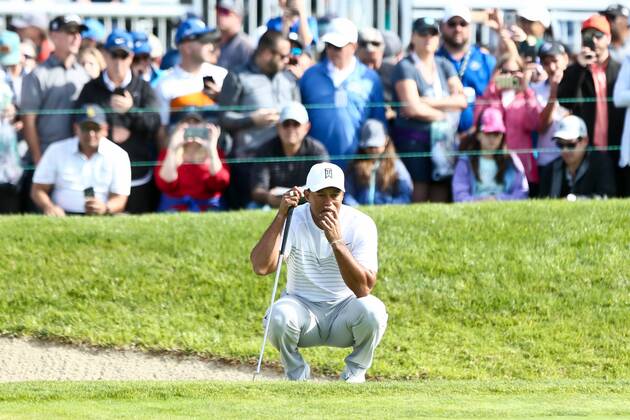 January 27, 2018 - San Diego, California, United States - Tiger Woods lines up a putt on the 18th green during the third round of the 2018 Farmers Insurance Open at Torrey Pines GC. Golf 2018: Farmers Insurance Open - Round 3 - ZUMAw109 20180127_zap_w109_053 Copyright: xDebbyxWongx
