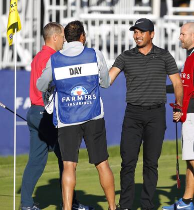 January 29, 2018 - San Diego, CA, USA - Jason Day celebrates with caddie Rika Batibasaga after winning the Farmers Insurance Open at the Torrey Pines Golf Course on January 29, 2018. Day beat Alex Noren, left, in a playoff. Farmers Insurance Open Playoff - ZUMAs44_ 20180129_zaf_s44_004 Copyright: xK.C.xAlfredx