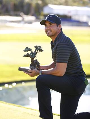 January 29, 2018 - San Diego, CA, USA - Jason Day poses with the trophy after winning the Farmers Insurance Open at the Torrey Pines Golf Course on January 29, 2018. Day beat Alex Noren in a playoff. Farmers Insurance Open Playoff - ZUMAs44_ 81732915st Copyright: xK.C.xAlfredx