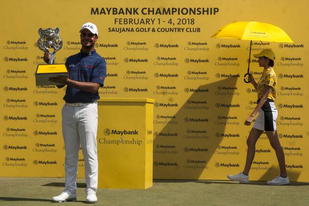 February 4, 2018 - Shah Alam, Kuala Lumpur, Malaysia - Shubhankar Sharma pro golf player from India poses with the Maybank Championship trophy after he won by the score of 21 under 267 during day four...The Maybank Championship 2018 golf event is being hosted on 1st to 4th February 2018 at Saujana Golf & Country Club. Maybank prize ceremony - ZUMAs197 81793028st Copyright: xFarisxHadziqx xSopaxImagesx