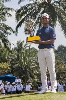 February 4, 2018 - Shah Alam, Kuala Lumpur, Malaysia - Shubhankar Sharma pro golf player from India poses with the Maybank Championship trophy after he won by the score of 21 under 267 during day four...The Maybank Championship 2018 golf event is being hosted on 1st to 4th February 2018 at Saujana Golf & Country Club. Maybank prize ceremony - ZUMAs197 81793031st Copyright: xFarisxHadziqx xSopaxImagesx
