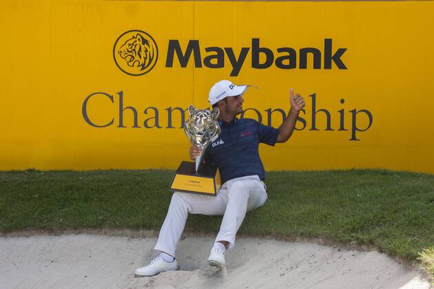 February 4, 2018 - Shah Alam, Kuala Lumpur, Malaysia - Shubhankar Sharma pro golf player from India poses with the Maybank Championship trophy after he won by the score of 21 under 267 during day four...The Maybank Championship 2018 golf event is being hosted on 1st to 4th February 2018 at Saujana Golf & Country Club. Maybank prize ceremony - ZUMAs197 81793042st Copyright: xFarisxHadziqx xSopaxImagesx