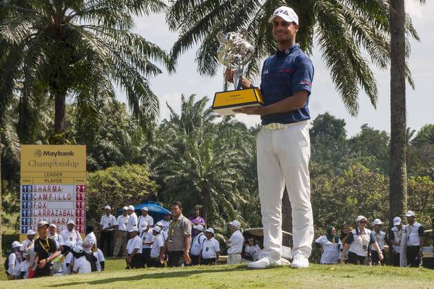 February 4, 2018 - Shah Alam, Kuala Lumpur, Malaysia - Shubhankar Sharma pro golf player from India poses with the Maybank Championship trophy after he won by the score of 21 under 267 during day four...The Maybank Championship 2018 golf event is being hosted on 1st to 4th February 2018 at Saujana Golf & Country Club. Maybank prize ceremony - ZUMAs197 81793046st Copyright: xFarisxHadziqx xSopaxImagesx