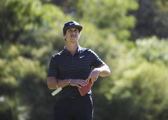 9th February 2018, Lake Karrinyup Country Club, Karrinyup, Australia; ISPS HANDA World Super 6 Perth golf, second round; Thorbjorn Olesen (DEN) checks his yardage for the next shot  ActionPlus11983373