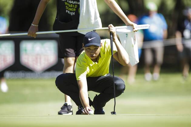 11th February 2018, Lake Karrinyup Country Club, Karrinyup, Australia; ISPS HANDA World Super 6 Perth golf, final round; Min Woo Lee (a) (AUS) lines up the ball to putt  ActionPlus11985028