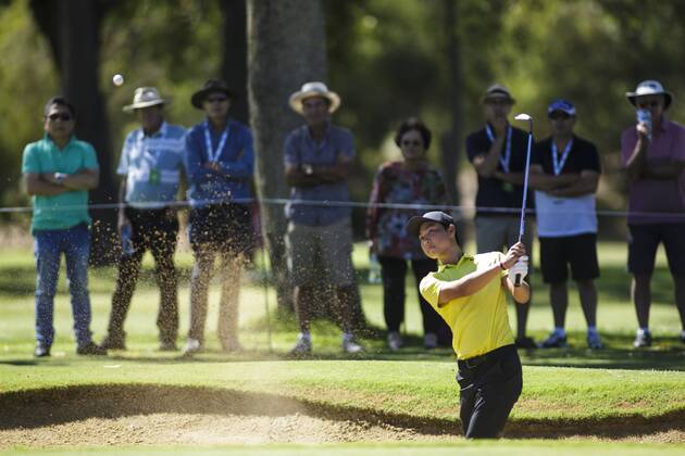 11th February 2018, Lake Karrinyup Country Club, Karrinyup, Australia; ISPS HANDA World Super 6 Perth golf, final round; Min Woo Lee (a) (AUS) splahes out of the bunker  ActionPlus11985029