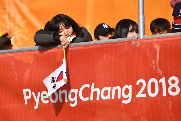 female fan supporter with Korean flag is tired and bored FIBT men s bobsleigh two man Bob Olympic sliding centre on 18 02 2018 Winter Olympics 2018 from 09 02 25 02 2018 in PyeongChang of South Korea