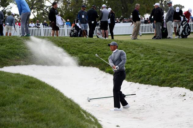 March 8, 2018 - Palm Harbor, Florida, U.S. - Tiger Woods works out at the practice green moments before driving the first tee while playing the Copperhead Course on Thursday during the first round of the Valspar Championship at the Innisbrook Golf and Spa Resort in Palm Harbor. Golf 2018: Valspar Championship Pro-Am - ZUMAs70_ 20180308_zan_s70_014 Copyright: xDouglasxR.xCliffordx