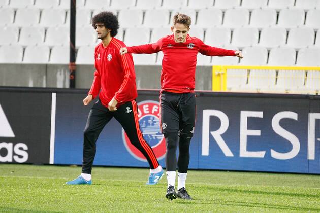 - BRUGGE, BELGIUM: Manchester s Marouane Fellaini and Manchester s Adnan Januzaj pictured during a training session of British soccer club Manchester United ManU in Brugge, Tuesday 25 August 2015. Tomorrow Belgian first league soccer team Club Brugge will play the return game of the play-offs of the Uefa Champions League competition against British soccer club Manchester United FC. Manchester United won the first leg 3-1. BRUNOxFAHY x84610566x