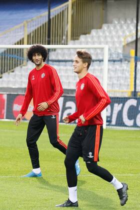 - BRUGGE, BELGIUM: Manchester s Marouane Fellaini and Manchester s Adnan Januzaj pictured during a training session of British soccer club Manchester United ManU in Brugge, Tuesday 25 August 2015. Tomorrow Belgian first league soccer team Club Brugge will play the return game of the play-offs of the Uefa Champions League competition against British soccer club Manchester United FC. Manchester United won the first leg 3-1. BRUNOxFAHY x84611127x