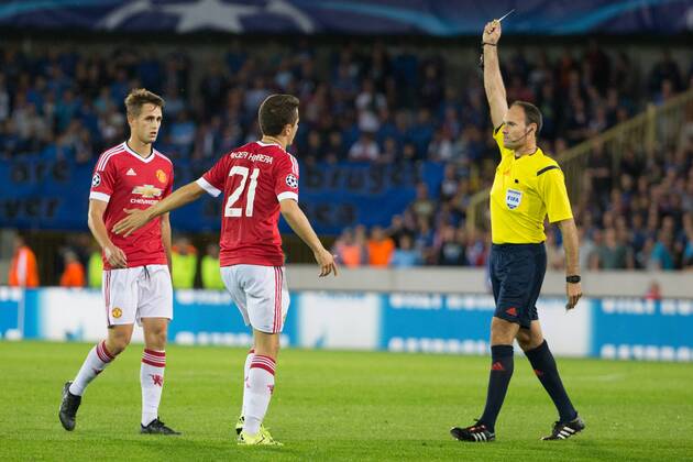 - BRUGGE, BELGIUM: Manchester s Ander Herrera receives a yellow card from referee Antonio Mateu Lahoz during a soccer game between Belgian first league team Club Brugge KV and British club Manchester United ManU FC in Brugge, Wednesday 26 August 2015, the return game of the play-offs of the UEFA Champions League competition. Manchester United won the first leg 3-1. KURTxDESPLENTER  x84638052x