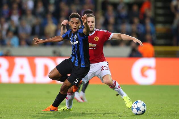 - BRUGGE, BELGIUM: Club s Jean-Charles Castelletto and Manchester s Luke Shaw fight for the ball during a soccer game between Belgian first league team Club Brugge KV and British club Manchester United ManU FC in Brugge, Wednesday 26 August 2015, the return game of the play-offs of the UEFA Champions League competition. Manchester United won the first leg 3-1. BRUNOxFAHY x84638474x