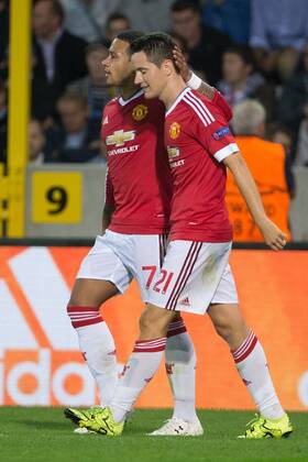 - BRUGGE, BELGIUM: Manchester s Ander Herrera (R) celebrates with his teammate Memphis Depay after scoring during a soccer game between Belgian first league team Club Brugge KV and British club Manchester United ManU FC in Brugge, Wednesday 26 August 2015, the return game of the play-offs of the UEFA Champions League competition. Manchester United won the first leg 3-1. KURTxDESPLENTER  x84639075x