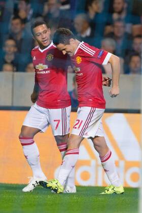 - BRUGGE, BELGIUM: Manchester s Ander Herrera (R) celebrates with his teammate Memphis Depay after scoring during a soccer game between Belgian first league team Club Brugge KV and British club Manchester United ManU FC in Brugge, Wednesday 26 August 2015, the return game of the play-offs of the UEFA Champions League competition. Manchester United won the first leg 3-1. KURTxDESPLENTER  x84639105x