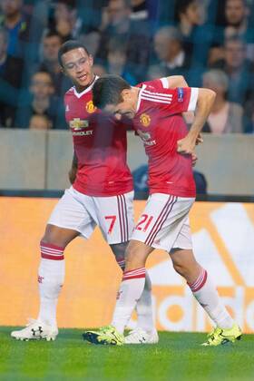 - BRUGGE, BELGIUM: Manchester s Ander Herrera (R) celebrates with his teammate Memphis Depay after scoring during a soccer game between Belgian first league team Club Brugge KV and British club Manchester United ManU FC in Brugge, Wednesday 26 August 2015, the return game of the play-offs of the UEFA Champions League competition. Manchester United won the first leg 3-1. KURTxDESPLENTER  x84639106x