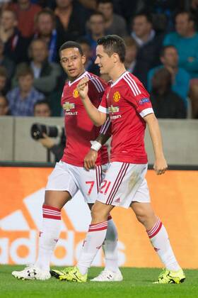 - BRUGGE, BELGIUM: Manchester s Ander Herrera (R) celebrates with his teammate Memphis Depay after scoring during a soccer game between Belgian first league team Club Brugge KV and British club Manchester United ManU FC in Brugge, Wednesday 26 August 2015, the return game of the play-offs of the UEFA Champions League competition. Manchester United won the first leg 3-1. KURTxDESPLENTER  x84639109x