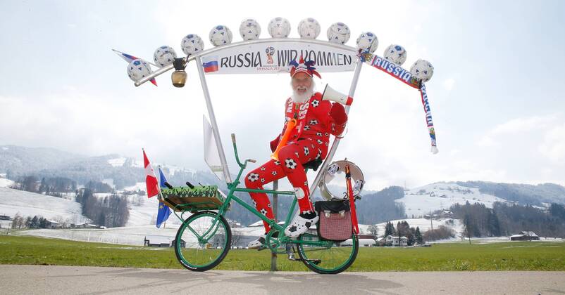 21 03 2018 Galgenen SZ SWITZERLAND Tourteufel Didi Senft visits Switzerland with his new bicycle construction for the 2018 World Cup in Russia