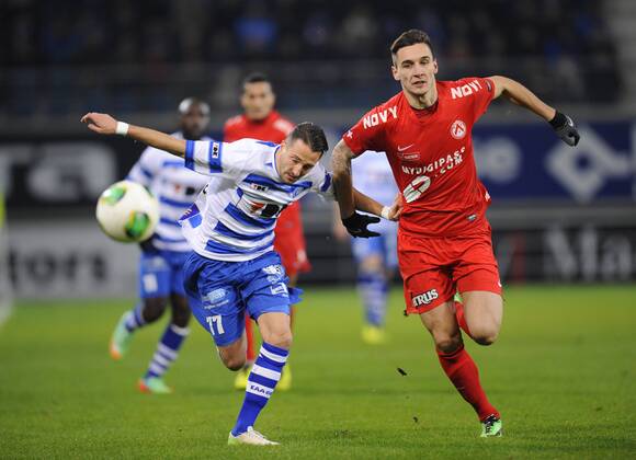 - GENT, BELGIUM: Gent s Danijel Milicevic and Kortrijk s Zarko Tomasevic fight for the ball during the Jupiler Pro League match between AA Gent and KV Kortrijk, in Gent, Saturday 18 January 2014, on the twenty-second day of the Belgian soccer championship. JOHNxTHYS  x51960392x