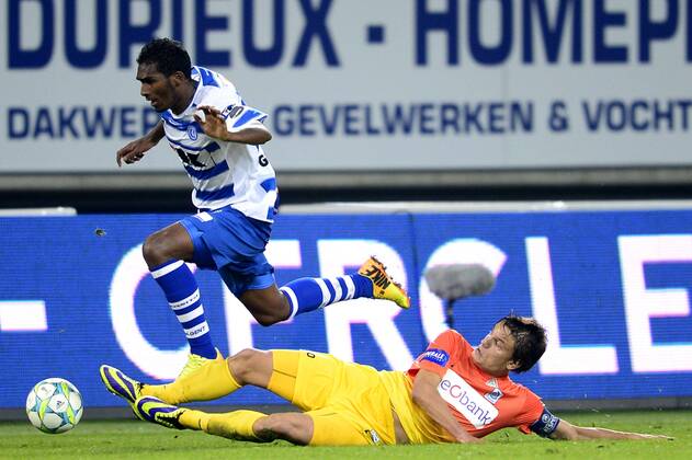 - GENT, BELGIUM: Gent s Renato Neto and Genk s Jelle Vossen fight for the ball during the Jupiler Pro League match between KAA Gent and KRC Genk, in Gent, Sunday 06 October 2013, on day 10 of the Belgian soccer championship. YORICKxJANSENS x47802146x