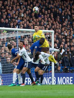 Chelsea v Tottenham Hotspur Premier League Hugo Lloris goalkeeper of Tottenham Hotspur punches the ball clear of Antonio Rudiger of Chelsea during the Premier League match at Stamford Bridge, London Content Not Available For UK Newspapers Copyright: xAlanxStanfordx FIL-11592-0038