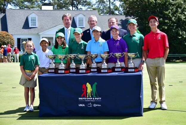 The winners of the Drive Chip & Putt National Finals pose together at Augusta National Golf Club during Masters week on April 1, 2018 in Augusta, Georgia.  AUG20180401316 KEVINxDIETSCH