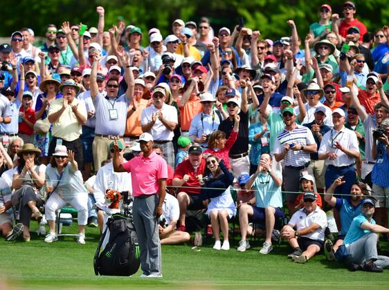 Patrons reacts after Tiger Woods made a shot on the 3rd green during a practice round before the start of the Masters at Augusta National Golf Club, on April 2, 2018 in Augusta, Georgia.  AUG20180402326 KEVINxDIETSCH
