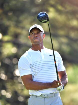Tiger Woods watches his drive on the 15th tee during a practice round prior to the Masters golf tournament at the Augusta National Golf Club, on April 3, 2018 in Augusta, Georgia.  AUG20180403304 KEVINxDIETSCH