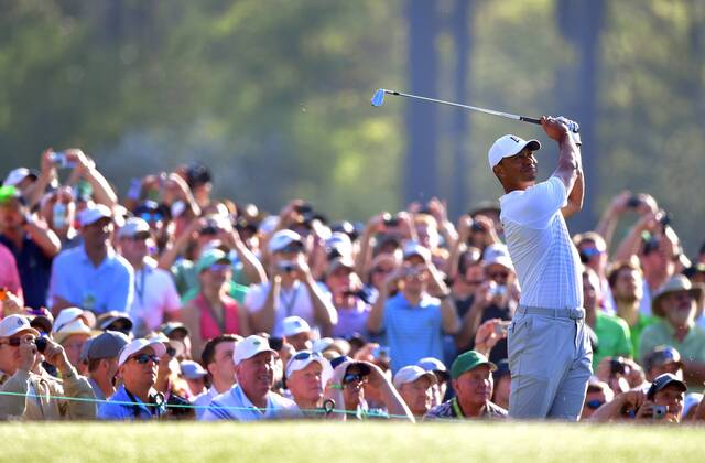 Tiger Woods hits off the 12th tee during a practice round prior to the Masters golf tournament at the Augusta National Golf Club, on April 3, 2018 in Augusta, Georgia.  AUG20180403319 KEVINxDIETSCH