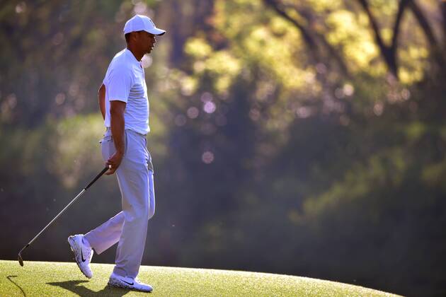 Tiger Woods walks on the 12th fairway during a practice round prior to the Masters golf tournament at the Augusta National Golf Club, on April 3, 2018 in Augusta, Georgia.  AUG20180403312a KEVINxDIETSCH