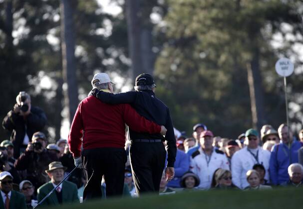 Honorary Starters Jack Nicklaus and Gary Player of South Africa walk off of the tee box together after hitting a tee shot on the first hole before the 1st round of the 2018 Masters Tournament at the Augusta National Golf Club in Augusta, Georgia, on April 5, 2018.  AUG20180405101 JOHNxANGELILLO