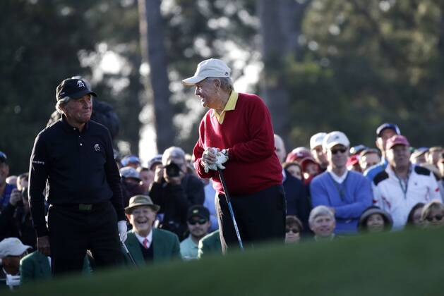 Honorary Starters Jack Nicklaus and Gary Player of South Africa smile at each other on the first hole tee box before the 1st round of the 2018 Masters Tournament at the Augusta National Golf Club in Augusta, Georgia, on April 5, 2018.  AUG20180405106 JOHNxANGELILLO