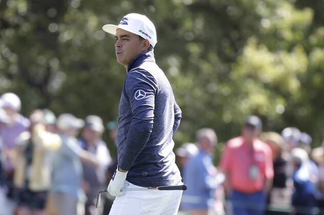 Rickie Fowler stands in the fairway on the 1st hole in the 2nd round of the 2018 Masters Tournament at the Augusta National Golf Club in Augusta, Georgia, on April 6, 2018.  AUG20180406105 JOHNxANGELILLO