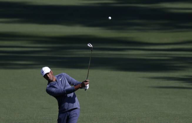 Tony Finau hits his approach shot to the 2nd hole in the 2nd round of the 2018 Masters Tournament at the Augusta National Golf Club in Augusta, Georgia, on April 6, 2018.  AUG20180406113 JOHNxANGELILLO