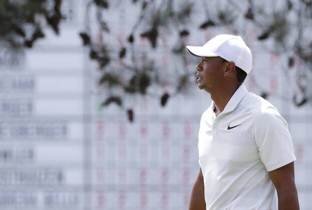 Tiger Woods reacts after a putt on the first hole in the 2nd round of the 2018 Masters Tournament at the Augusta National Golf Club in Augusta, Georgia, on April 6, 2018.  AUG20180406127 JOHNxANGELILLO