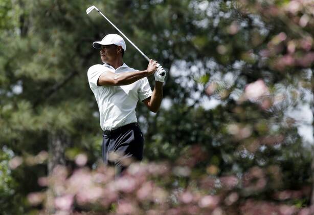 Tiger Woods hits an iron from the second hole fairway in the 2nd round of the 2018 Masters Tournament at the Augusta National Golf Club in Augusta, Georgia, on April 6, 2018.  AUG20180406130 JOHNxANGELILLO