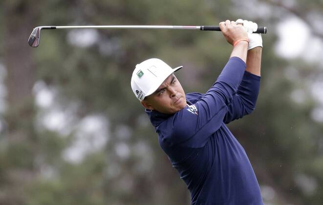 Rickie Fowler hits a tee ball on hole 4 in the 3rd round of the 2018 Masters Tournament at the Augusta National Golf Club in Augusta, Georgia, on April 7, 2018.  AUG20180407115 JOHNxANGELILLO