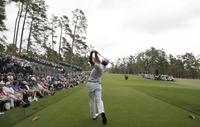 Golf: Masters Tournament 3rd round Hideki Matsuyama of Japan hits his tee shot on the 14th hole in the third round of the Masters Tournament in Augusta, Georgia, on April 7, 2018. 