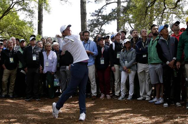 Rory McIlroy hits his approach shot from the rough to the 1st hole in the final round of the 2018 Masters Tournament at the Augusta National Golf Club in Augusta, Georgia, on April 8, 2018.  AUG20180408111 JOHNxANGELILLO