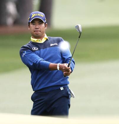 Golf: Matsuyama at the Masters Tournament Hideki Matsuyama of Japan hits an approach shot on the first hole during the final round of the Masters Tournament in Augusta, Georgia, on April 8, 2018. 