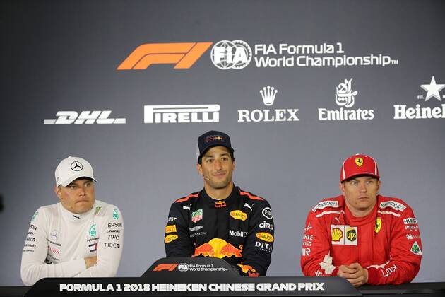(From left) First runner-up Finnish F1 driver Valtteri Bottas of Mercedes, winner Australian F1 driver Daniel Ricciardo of Red Bull Racing and second runner-up Finnish F1 driver Kimi Raikkonen of Ferrari attend the press conference PK Pressekonferenz after the 2018 Formula One Chinese Grand Prix at the Shanghai International Circuit in Shanghai, China, 15 April 2018. Red Bull driver Daniel Ricciardo yanked off his right shoe, poured champagne into it as he stood on the podium, and then drank up to his unlikely victory in Sunday s Chinese Grand Prix. The Australian started from the third row, but took advantage when the safety car came out on the 31st lap to allow him to get fresh, soft tires when the other leaders were running on worn rubber and couldn t get in quickly to change. Red Bull s Daniel Ricciardo wins Chinese Grand Prix; 6th career win  20180415_28755